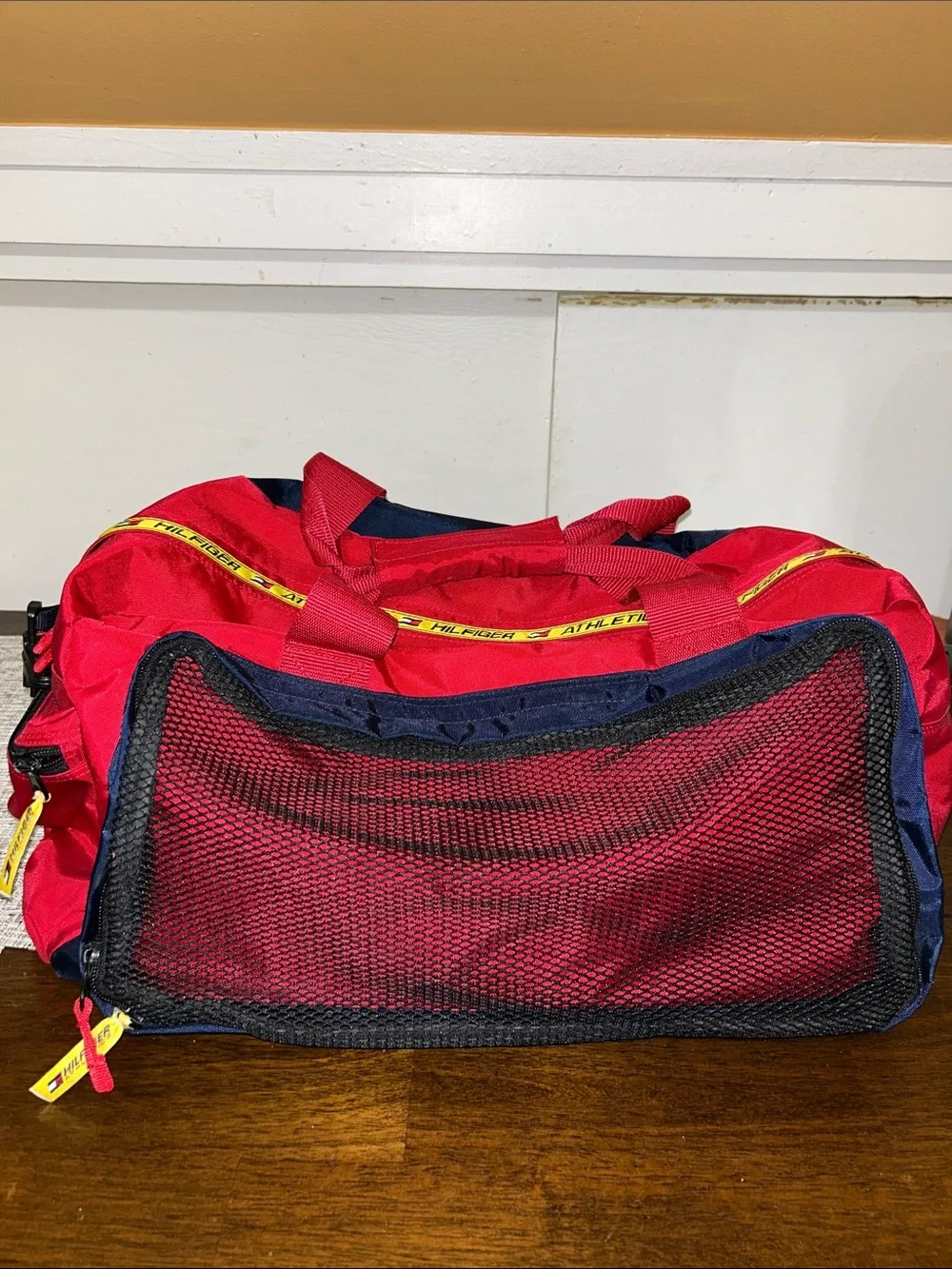 Red Athletic Duffle Bag with Navy and Yellow Accents Tommy Hilfiger